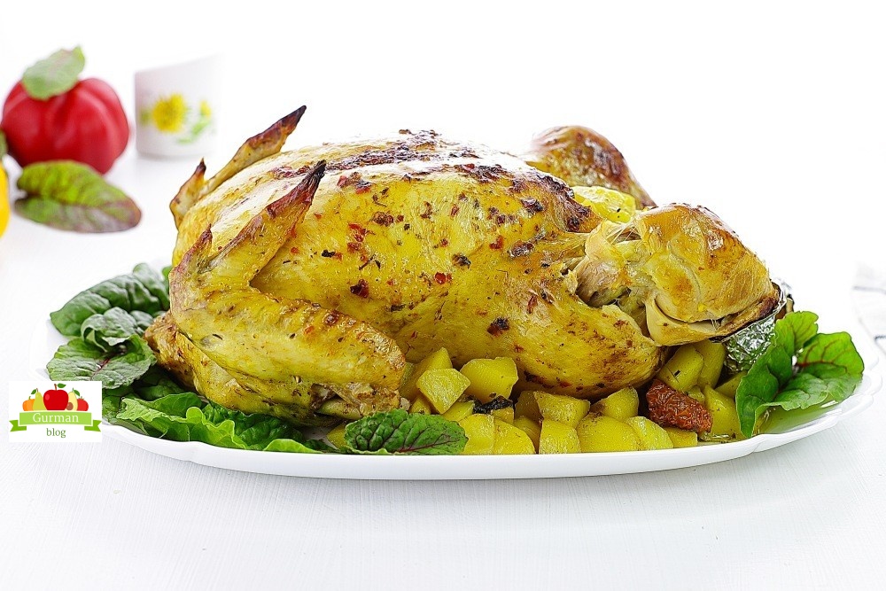 Фаршированная курица в духовке с картошкой целиком
