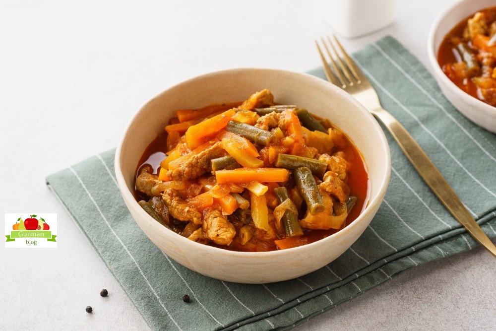 Свинина по-китайски в кисло-сладком соусе с овощами